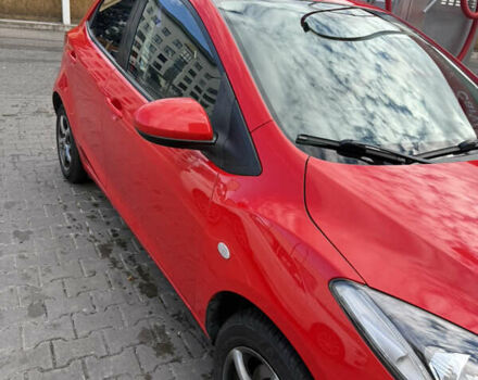 Красный Мазда 2, объемом двигателя 1.5 л и пробегом 208 тыс. км за 6200 $, фото 1 на Automoto.ua