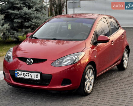 Червоний Мазда 2, об'ємом двигуна 1.5 л та пробігом 138 тис. км за 6800 $, фото 1 на Automoto.ua