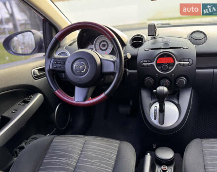 Червоний Мазда 2, об'ємом двигуна 1.5 л та пробігом 138 тис. км за 6800 $, фото 40 на Automoto.ua