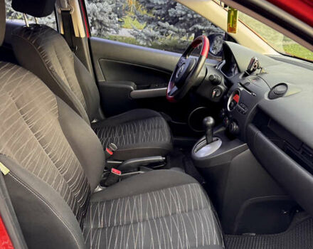 Червоний Мазда 2, об'ємом двигуна 1.5 л та пробігом 138 тис. км за 6800 $, фото 41 на Automoto.ua