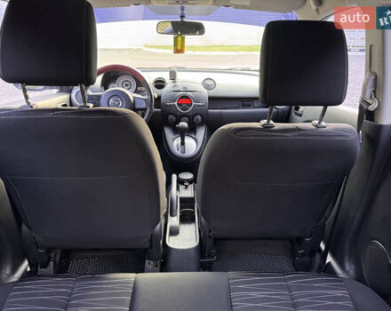 Червоний Мазда 2, об'ємом двигуна 1.5 л та пробігом 138 тис. км за 6800 $, фото 27 на Automoto.ua