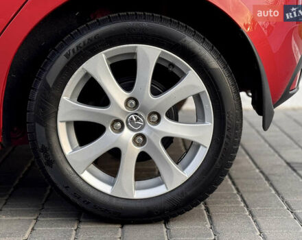 Червоний Мазда 2, об'ємом двигуна 1.5 л та пробігом 138 тис. км за 6800 $, фото 37 на Automoto.ua