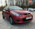 Красный Мазда 2, объемом двигателя 1.4 л и пробегом 110 тыс. км за 5213 $, фото 1 на Automoto.ua
