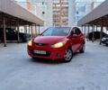 Красный Мазда 2, объемом двигателя 1.4 л и пробегом 223 тыс. км за 3999 $, фото 1 на Automoto.ua