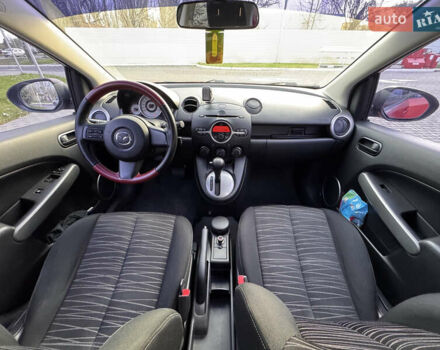 Червоний Мазда 2, об'ємом двигуна 1.5 л та пробігом 138 тис. км за 6800 $, фото 44 на Automoto.ua