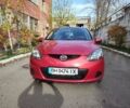 Красный Мазда 2, объемом двигателя 1.5 л и пробегом 138 тыс. км за 6500 $, фото 1 на Automoto.ua