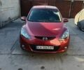 Красный Мазда 2, объемом двигателя 1.5 л и пробегом 160 тыс. км за 6200 $, фото 2 на Automoto.ua