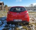 Красный Мазда 2, объемом двигателя 1.4 л и пробегом 207 тыс. км за 3900 $, фото 3 на Automoto.ua
