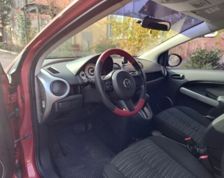 Красный Мазда 2, объемом двигателя 1.5 л и пробегом 138 тыс. км за 6500 $, фото 4 на Automoto.ua