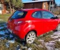 Красный Мазда 2, объемом двигателя 1.4 л и пробегом 207 тыс. км за 3900 $, фото 1 на Automoto.ua