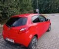 Червоний Мазда 2, об'ємом двигуна 1.5 л та пробігом 280 тис. км за 5600 $, фото 2 на Automoto.ua
