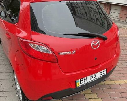 Красный Мазда 2, объемом двигателя 1.5 л и пробегом 62 тыс. км за 7000 $, фото 3 на Automoto.ua