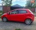 Красный Мазда 2, объемом двигателя 1.5 л и пробегом 176 тыс. км за 5800 $, фото 1 на Automoto.ua