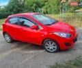 Красный Мазда 2, объемом двигателя 1.5 л и пробегом 176 тыс. км за 5800 $, фото 1 на Automoto.ua
