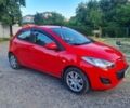 Красный Мазда 2, объемом двигателя 1.5 л и пробегом 176 тыс. км за 5900 $, фото 1 на Automoto.ua