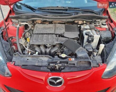 Красный Мазда 2, объемом двигателя 1.5 л и пробегом 176 тыс. км за 5800 $, фото 2 на Automoto.ua