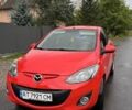 Красный Мазда 2, объемом двигателя 1.5 л и пробегом 157 тыс. км за 7700 $, фото 1 на Automoto.ua