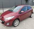 Красный Мазда 2, объемом двигателя 1.5 л и пробегом 55 тыс. км за 7000 $, фото 1 на Automoto.ua