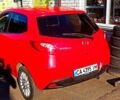 Красный Мазда 2, объемом двигателя 1.3 л и пробегом 130 тыс. км за 5700 $, фото 1 на Automoto.ua