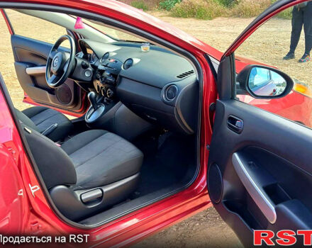 Красный Мазда 2, объемом двигателя 1.5 л и пробегом 52 тыс. км за 7900 $, фото 6 на Automoto.ua
