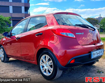 Красный Мазда 2, объемом двигателя 1.5 л и пробегом 52 тыс. км за 7900 $, фото 4 на Automoto.ua