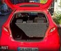 Красный Мазда 2, объемом двигателя 1.3 л и пробегом 130 тыс. км за 5700 $, фото 2 на Automoto.ua