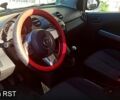 Красный Мазда 2, объемом двигателя 1.3 л и пробегом 130 тыс. км за 5700 $, фото 4 на Automoto.ua