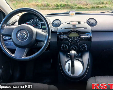 Красный Мазда 2, объемом двигателя 1.5 л и пробегом 52 тыс. км за 7900 $, фото 5 на Automoto.ua