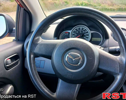 Красный Мазда 2, объемом двигателя 1.5 л и пробегом 52 тыс. км за 7900 $, фото 7 на Automoto.ua