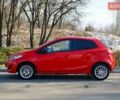 Красный Мазда 2, объемом двигателя 1.3 л и пробегом 130 тыс. км за 5400 $, фото 2 на Automoto.ua