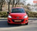 Красный Мазда 2, объемом двигателя 1.3 л и пробегом 130 тыс. км за 5400 $, фото 1 на Automoto.ua