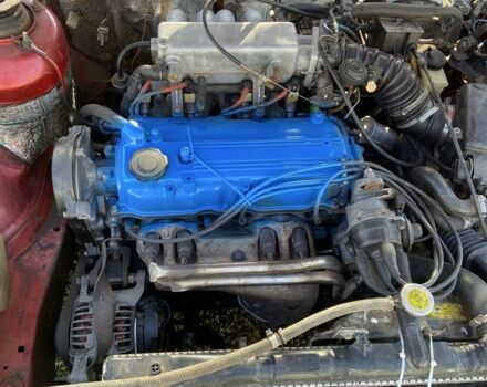 Красный Мазда 2, объемом двигателя 2 л и пробегом 310 тыс. км за 1119 $, фото 6 на Automoto.ua