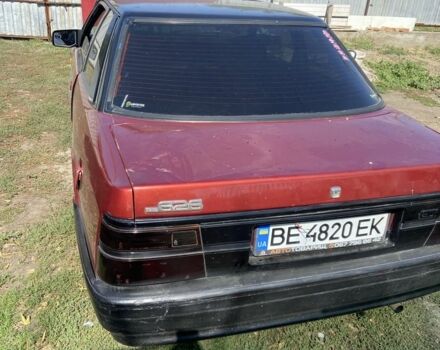 Красный Мазда 2, объемом двигателя 2 л и пробегом 310 тыс. км за 1119 $, фото 5 на Automoto.ua