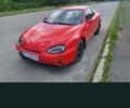 Красный Мазда 2, объемом двигателя 2 л и пробегом 380 тыс. км за 3695 $, фото 1 на Automoto.ua