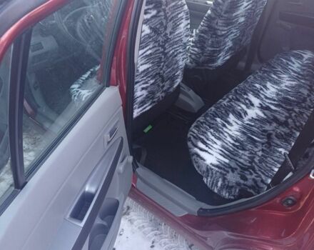 Красный Мазда 2, объемом двигателя 1.3 л и пробегом 164 тыс. км за 3500 $, фото 2 на Automoto.ua