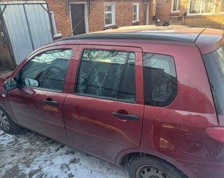 Красный Мазда 2, объемом двигателя 1.3 л и пробегом 164 тыс. км за 3500 $, фото 1 на Automoto.ua