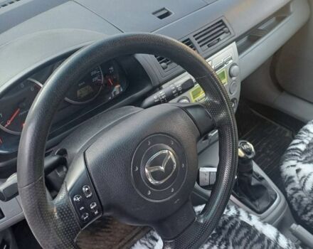 Красный Мазда 2, объемом двигателя 1.3 л и пробегом 164 тыс. км за 3500 $, фото 3 на Automoto.ua