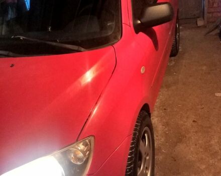 Червоний Мазда 2, об'ємом двигуна 1.2 л та пробігом 160 тис. км за 4000 $, фото 1 на Automoto.ua