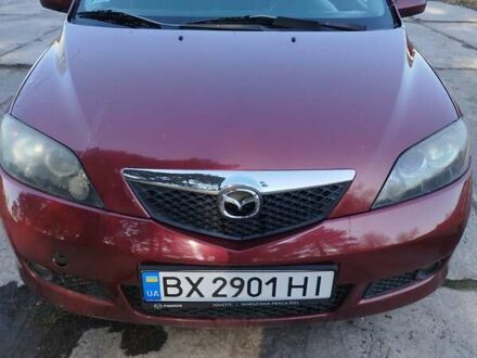 Красный Мазда 2, объемом двигателя 1.39 л и пробегом 118 тыс. км за 4200 $, фото 1 на Automoto.ua