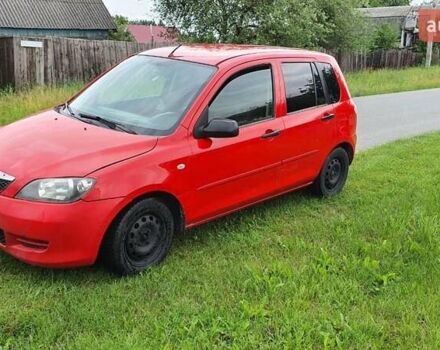 Красный Мазда 2, объемом двигателя 1.2 л и пробегом 329 тыс. км за 1850 $, фото 1 на Automoto.ua