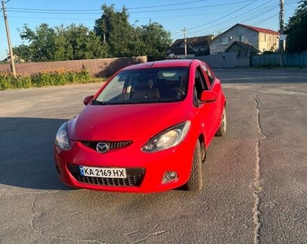Красный Мазда 2, объемом двигателя 1.4 л и пробегом 223 тыс. км за 3300 $, фото 1 на Automoto.ua