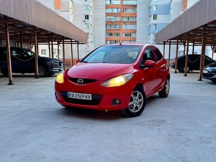 Красный Мазда 2, объемом двигателя 1.4 л и пробегом 223 тыс. км за 3999 $, фото 1 на Automoto.ua