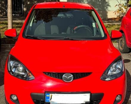 Красный Мазда 2, объемом двигателя 1.5 л и пробегом 208 тыс. км за 6000 $, фото 1 на Automoto.ua