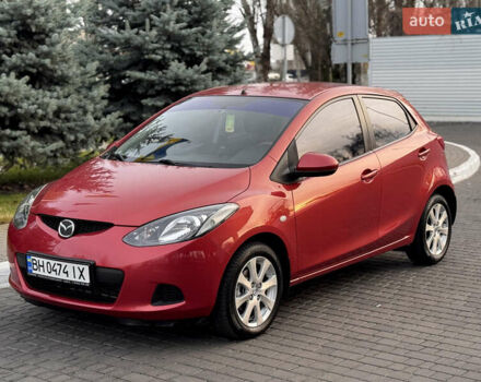 Червоний Мазда 2, об'ємом двигуна 1.5 л та пробігом 138 тис. км за 6800 $, фото 1 на Automoto.ua
