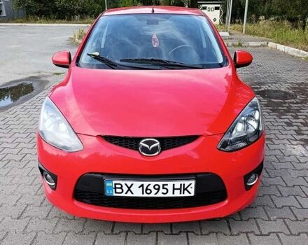 Красный Мазда 2, объемом двигателя 1.5 л и пробегом 280 тыс. км за 5600 $, фото 1 на Automoto.ua