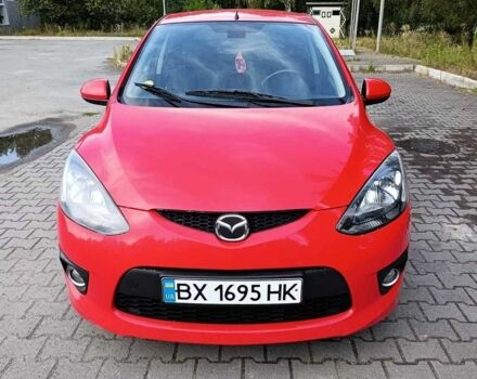 Красный Мазда 2, объемом двигателя 1.5 л и пробегом 280 тыс. км за 5600 $, фото 1 на Automoto.ua