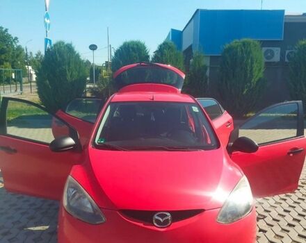 Красный Мазда 2, объемом двигателя 1.3 л и пробегом 379 тыс. км за 5499 $, фото 1 на Automoto.ua
