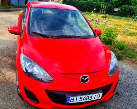 Красный Мазда 2, объемом двигателя 1.5 л и пробегом 175 тыс. км за 5800 $, фото 1 на Automoto.ua