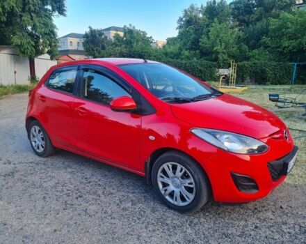 Красный Мазда 2, объемом двигателя 1.5 л и пробегом 176 тыс. км за 5900 $, фото 1 на Automoto.ua