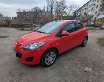Красный Мазда 2, объемом двигателя 1.5 л и пробегом 175 тыс. км за 5800 $, фото 1 на Automoto.ua
